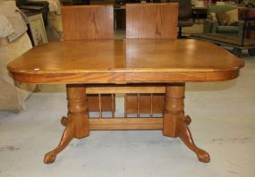 Oak Dining Table Has trestle base and two 18