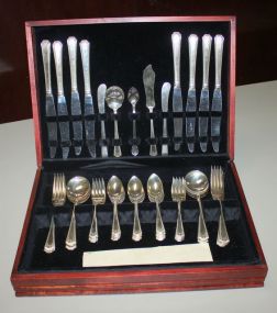 Silverplate Set in Box Consisting of eight dinner forks, eight salad forks, sixteen teaspoons, eight soup spoons, eight knives, two butter spreaders, sugar spoon, master butter, jelly spoon