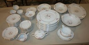 Early Spring Narumi China Consisting of thirteen dinner plates, fourteen salad plates, one bread and butter plate, eight saucers, five cups, creamer, sugar, gravy, two vegetable bowls, platter, two cereal bowls
