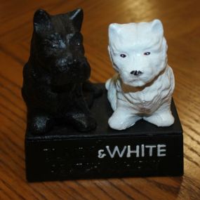Reproduction Cast Iron Black and White Scotch Whiskey Statue