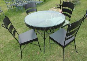 Round Metal Patio Table and Four Matching Chairs Table has glass top; table 37