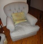 Pair of larg tuffed arm chairs and ottoman