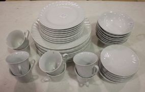 Set of Lynns China Which includes eight dinner plates, eight salad plates, eight cups/saucers, seven cereal bowls.