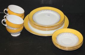 Small Set of English Yellow and White Porcelain 4 cups/ 4 saucers, 5 salad plates, 1 serving plate.