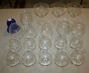 Sixteen Brandy Glasses, Three Martini Glasses, and Blue Insert
