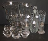 Lot of Glass shakers, cups, two pitchers, decanter, and vases.