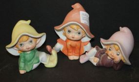 Three Porcelain Painted Elves
