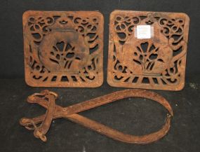 Two Cast Iron Trivets and Cast Iron Tongs