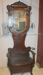 Oak Carved Gingerbread Lift Seat Hall Tree Has beveled mirror and original drip pan; 36