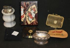 Two Cigarette Lighters and Various Change Purses Compact