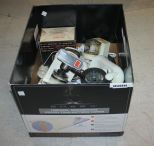 Box Lot of Kitchen Appliances food chopper, hand mixer, can opener, pepper mill, rice cooker, and blender.