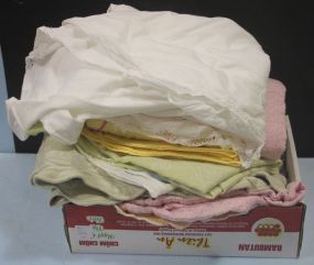 Box Lot of Pillow Cases and Tablecloth