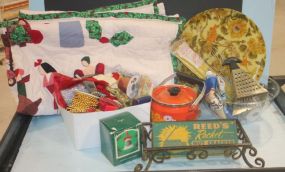 Box Lot with Enamel Tea Pot, Christmas Ornaments Nutcracker, Cookie Cutters, and Small Quilt