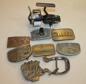 Eight Brass Belt Buckles and Mitchell Casting Rod