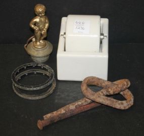 Porcelain Moistener, Cupid Brass Stopper, and Pieces of Iron