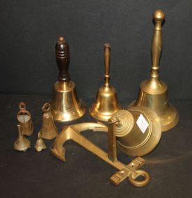 Group of Brass Bells one on wall