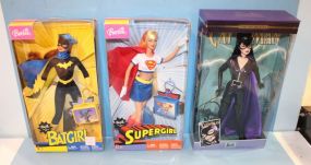 Barbie Cat Woman, Batgirl, and Supergirl Action Figures