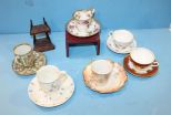 Five Demitasse Cups and Saucers