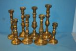 Lot of Eight Brass Candlesticks