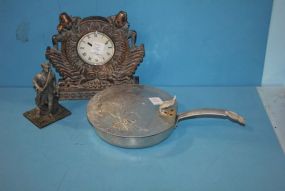 Aluminum Bread Crumber, Quartz Clock, and Small Statue