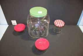 Four Vintage Glass Jars