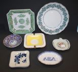 Group of porcelain plates and small dishes