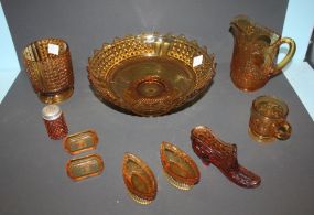 Various Pieces of Amber Depression Glass
