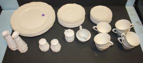 Four Steubenville Plates, Cups and Saucers and Five other Porcelain Pieces Four Steubenville Plates, Cups and Saucers and Five other Porcelain Pieces.