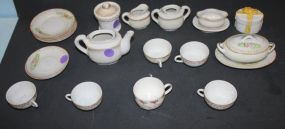 Grouping of Miniature Dishes six cups & saucers, gravy, teapot, sugar, creamer, tureen, and boxes.