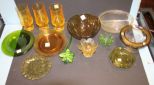 Three Yellow Glass, Green Plates, Depression Hand painted Candy Dish, and Glass Flower Three Yellow Glass, Green Plates, Depression Hand painted Candy Dish, and Glass Flower.