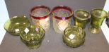 Two Cranberry Rim Candleholders, Two Green Glass Urns, and Three Green Bowls Two Cranberry Rim Candleholders 6