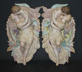 Pair of Handpainted Porcelain Figural Wall Plaques