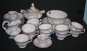 China Set Creamer, Teapot, Two plates, 11 cups.