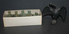 Cast Iron Eagle and box of ink bottles