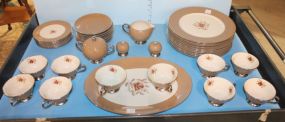 Set of Flintidge China Set consisting of 10 dinner plates, oval platter, 17 saucers, 10 cups, salt and pepper, creamer (with chip) and sugar.