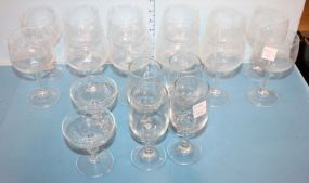 Set of 18 Clear Glass Stems set of 18 clear glass stems, various sizes.