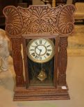 Victorian Eared Oak Mantel Clock Victorian eared oak mantel clock with gold etching of egret. 14