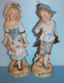 Pair of Handpainted Bisque Figurines base on boy broken and repaired, 13