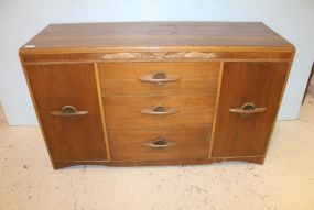 Danish Style Sideboard Vintage blonde wood sideboard with three center drawers and door on each side. 55