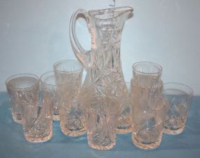 Cut Glass Pitcher and Eleven Tumblers Cut glass pitcher and eleven tumblers