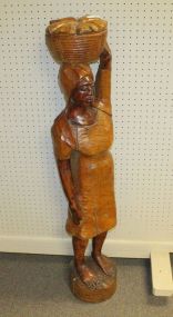 Large Hand Carved Figure Large Hand carved figure of lady with basket. 88
