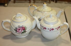 Teapot Collection Two Vintage teapots and covered sugar.