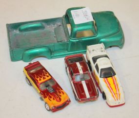 Four Cast Iron Toy Cars Four Cast Iron Toy Cars