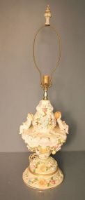 Vintage Capidomonte Style Lamp Very large and ornate porcelain lamp with cupids holding flowers, 35 1/2