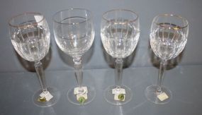 Four Waterford Glasses Three Grenville goblets (gold rim) one carelton platinum goblet 8
