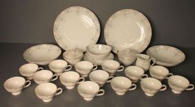 Partial Set of Narumi China Narumi china consisting of fifteen cups, serving bowl and under plate, two sugar bowls, two 9