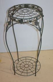 Metal Round Plant Stand has bottom shelf and ivy leaf trim