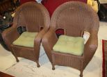 Two Brown Wicker Arm Chairs 29