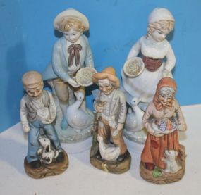 Two Porcelain Figurines of Children and Duck and Three Painted Figurines children figurine 8 1/2
