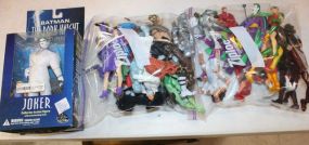 Joker Action Figure and Two Bags of Action Figures Joker Action Figure and Two Bags of Action Figures